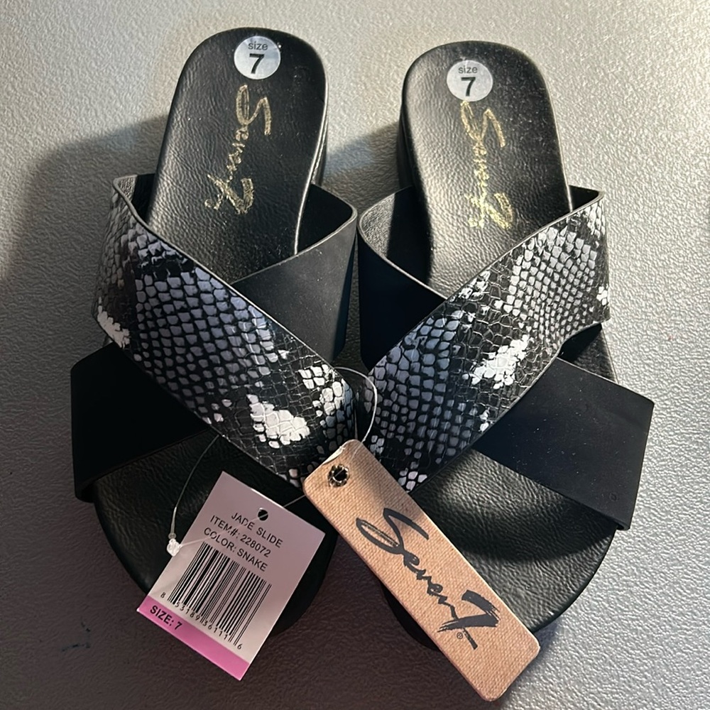 Never worn sandals. Snakeskin design